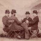 Four men playing cards
